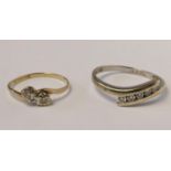 A 9ct white gold and diamond set five stone ring, stated weight 0.15ct, P and a 9ct gold and diamond