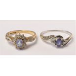 A 9ct gold sapphire and diamond cluster ring, diamond weight stated 0.15ct, N and another similar,