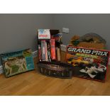 A boxed Scalextric racing set 'Grand Prix' together with Tri-ang Minic loose track, cars and