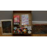 A collection of 1970's/80's Rubik's Cubes and early jigsaw puzzles.