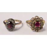 Two 9ct gold garnet and white stone cluster rings, P and M, 5.8gm