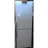 A Siemens freestanding fridge/freezer. 166cm tall, 59cm wide, 60cm deep.