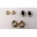 A 9ct gold pair of sapphire and diamond swirl ear studs, a pair of sapphire and white stone