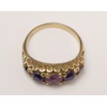 A 9ct gold five stone amethyst ring, carved claw set with graduated stones, ?, 3.2gm