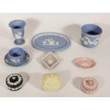 A collection of various coloured Wedgewood Jasperware, to include vases, lidded pots, cup & saucer