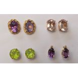 Two pairs of 9ct gold and amethyst earstuds, a peridot pair and a gemset pair, 3.8gm