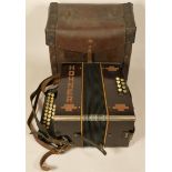 A 1930's Hohner accordion club model 11 with original leather carrying case.