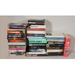 Three boxes of paperback & hardback books topics to include, crime, thriller, humour, together