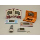 A collection of Nintendo Games and watch handheld games to include, Donkey Kong, Mario Bros.,