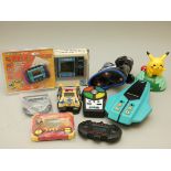 Ten handheld and table top electronic games to include, Alien Intruder, Race'n'Chase Pocket Simon,