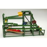 A Meccano display model of a working industrial conveyer belt system, motorised. 60cm wide, 37cm