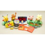 A collection of Pokemon electronic toys to include, Battle Arena, Charmander, Pikachu, Jigglypuff,