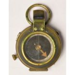 A WWI British brass compass, by F-L, number 92042, dated 1917, leather case, inscribed F.