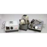 Three 35mm slide projectors, including a Rank Aldis tutor 500, with box and accessories, also