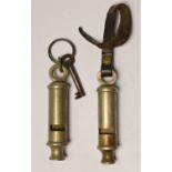 Two Hudson whistles, both dated 1915