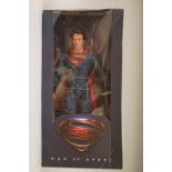 A Superman 'Man of Steel' 1/4 scale figure by Neca The model stands just over 18 inches and has over