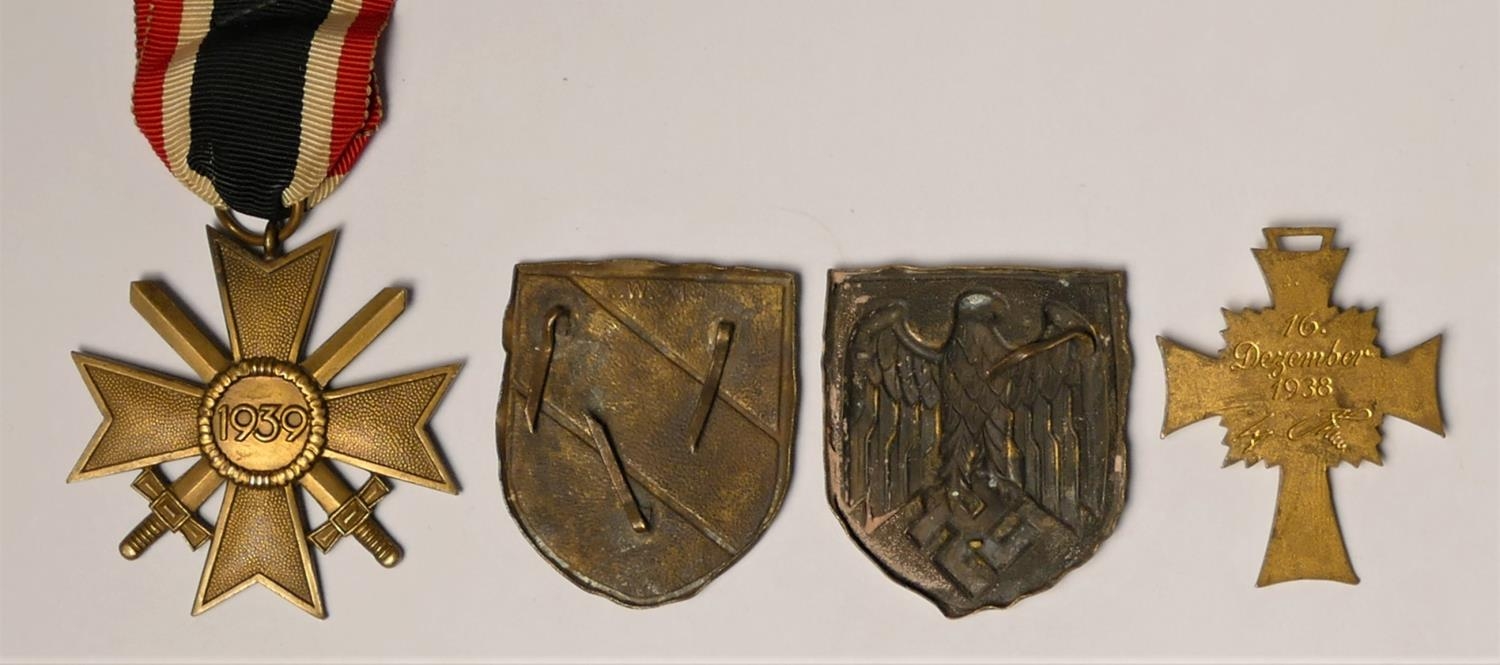 WWII German Mother Cross in gold, Merit Cross with swords and tow Pith helmet badges - Image 2 of 2