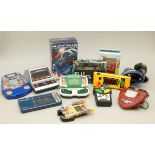 A collection of 12 tabletop and handheld video games, titles to include, Blip, Cosmic Invader,