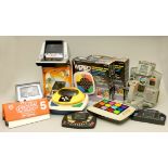 A collection of 12 tabletop and handheld electronic battery games to include, Wizard, Waddingtons