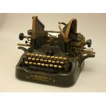 A typewriter made by The Oliver typewriter company, model #9, also knows as a "bat-wing". 449,000