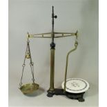 A set of W&T Avery butchers cast iron and brass scales, with porcelain plate, the plate is decorated