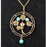 An Edwardian 9ct rose gold and turquoise pendant, 9ct tab, 27mm, later chain, 3.7gm