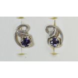 A pair of white gold and tanzanite?? ear studs,2.1gm