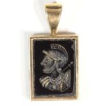 A gold mounted onyx cameo pendant, carved with a Roman soldier, 28mm overall