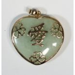 A 9ct gold mounted jadite(untested) pendant, with character marks and hearts, 25 x 25mm