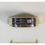 A 9ct gold and diamond signet ring, T, 2.3gm