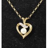 A 9ct gold, diamond and cultured pearl heart shape pendant, 3.8gm, case
