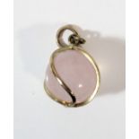 A gold mounted rose quartz ball pendant, 17mm