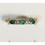 A 9ct gold emerald and diamond ring, S, 1.6gm
