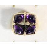 A 14ct gold and amethyst cabochon dress ring, 17 x 17mm, O, 5.2gm