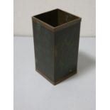 A square Japanese bronze brush pot, decorated on two sides with character marks, to the other two