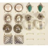 Seven pairs of silver ear rings, 48gm.