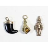 A 9ct gold tigers eye and claw charm, a 9ct gold baby charm and a claw charm