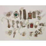 A collection of 24 various charms, some enameled, 84gm