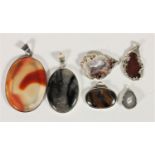 Six silver mounted agate pendants