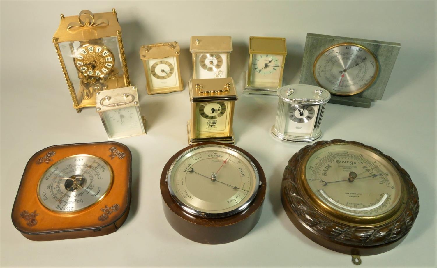 A brass cased kundo anniversary mantle clock together with a collection of barometers and carriage - Image 3 of 4