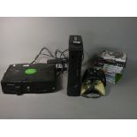 An XBox 120GB HDD with 2 controllers, together with an XBox including 1 controller and several games