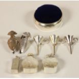 Two silver napkin clips, a silver pin cushion, three scent funnels and three scent bottles, 47.4gm