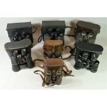 A collection of binoculars and optics, including brands such as Cobra, Crown and Prinz