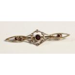 An Edwardian style 9ct gold garnet and diamond bar brooch, Birmingham 1990, 48mm, 2.5gm