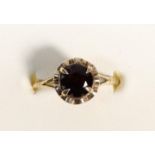 A 9ct gold and garnet ring, P, 1.8gm