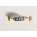 An 18ct gold three stone diamond ring, K 1/2, 1.8gm