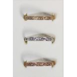 A set of three 9ct rose, yellow and white gold Celtic rings, p, 3.4