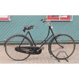 A vintage Raleigh Popular Lady's loop frame Bicycle, frame number UI6849, with 28in wheels, rod