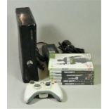 An Xbox 360 'slim' games console, untested, including power lead, controller, six games including