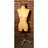 A mid Century 3/4 female bust mannequin by Fusion USA, on a cast metal adjustable stand (matching